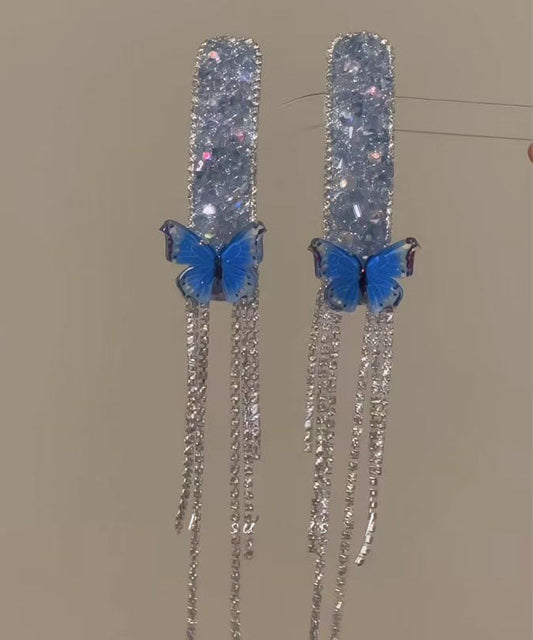 Par de horquillas con borlas de mariposa de circonita de aleación azul bohemia