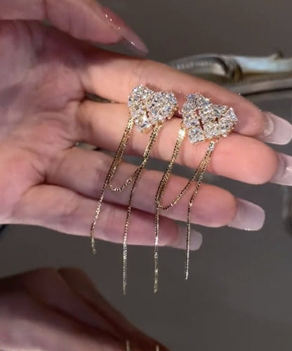 Pendientes bohemios con borlas de circonitas doradas y cobre