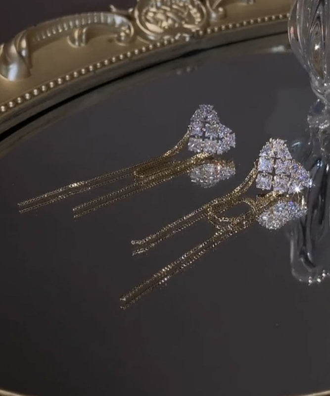 Pendientes bohemios con borlas de circonitas doradas y cobre