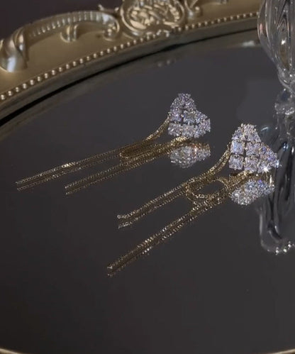 Pendientes bohemios con borlas de circonitas doradas y cobre