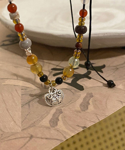 Boho Halskette mit Anhänger aus Kupferperlen und Achat