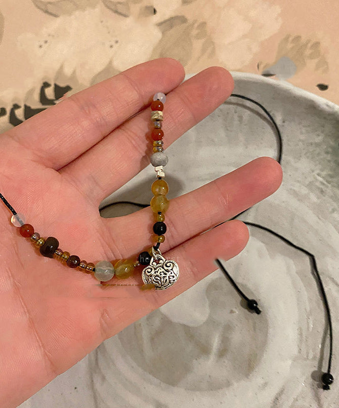 Boho Halskette mit Anhänger aus Kupferperlen und Achat