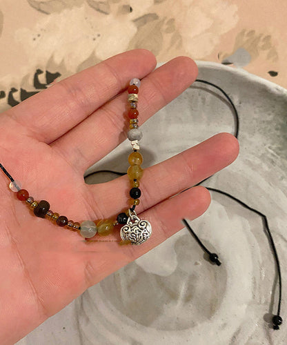 Boho Halskette mit Anhänger aus Kupferperlen und Achat