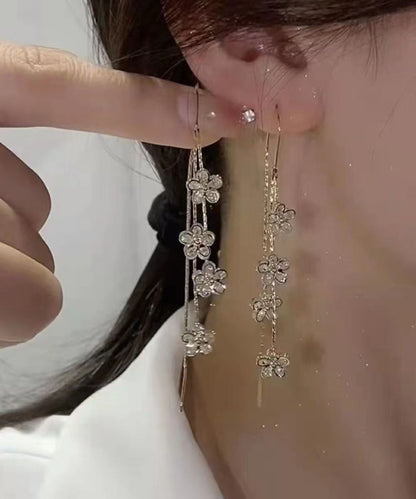 Pendientes bohemios con borlas florales de circonitas doradas y cobre