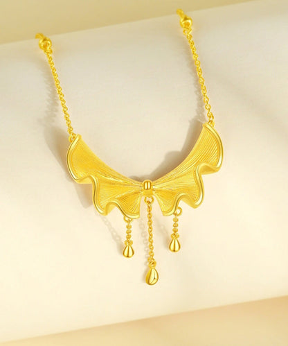 Collar con colgante de borla y lazo dorado estilo bohemio en plata de ley dorada