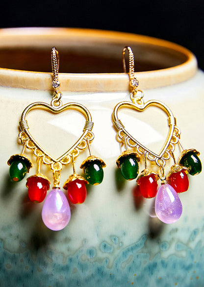 Pendientes colgantes con borlas y cuentas multicolores estilo bohemio en forma de corazón