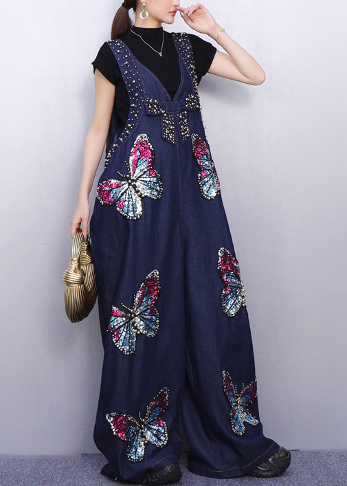 Mono vaquero bohemio azul marino con lentejuelas de mariposa de gran tamaño para primavera