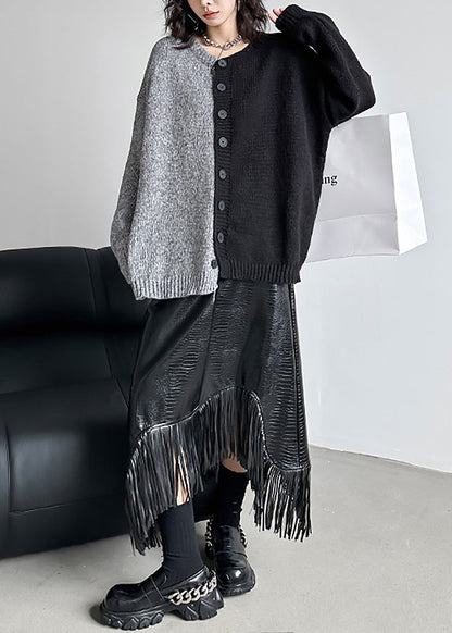 Faldas asimétricas de piel sintética con borlas negras de Boutique Primavera