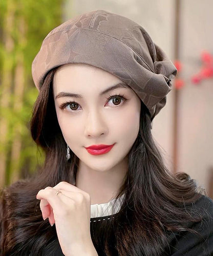 Boutique-Barettmütze aus schwarzer, bedruckter, knittriger Seide