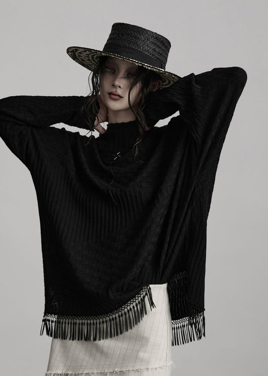 Top de punto de lana asimétrico con borlas negras de Boutique para invierno