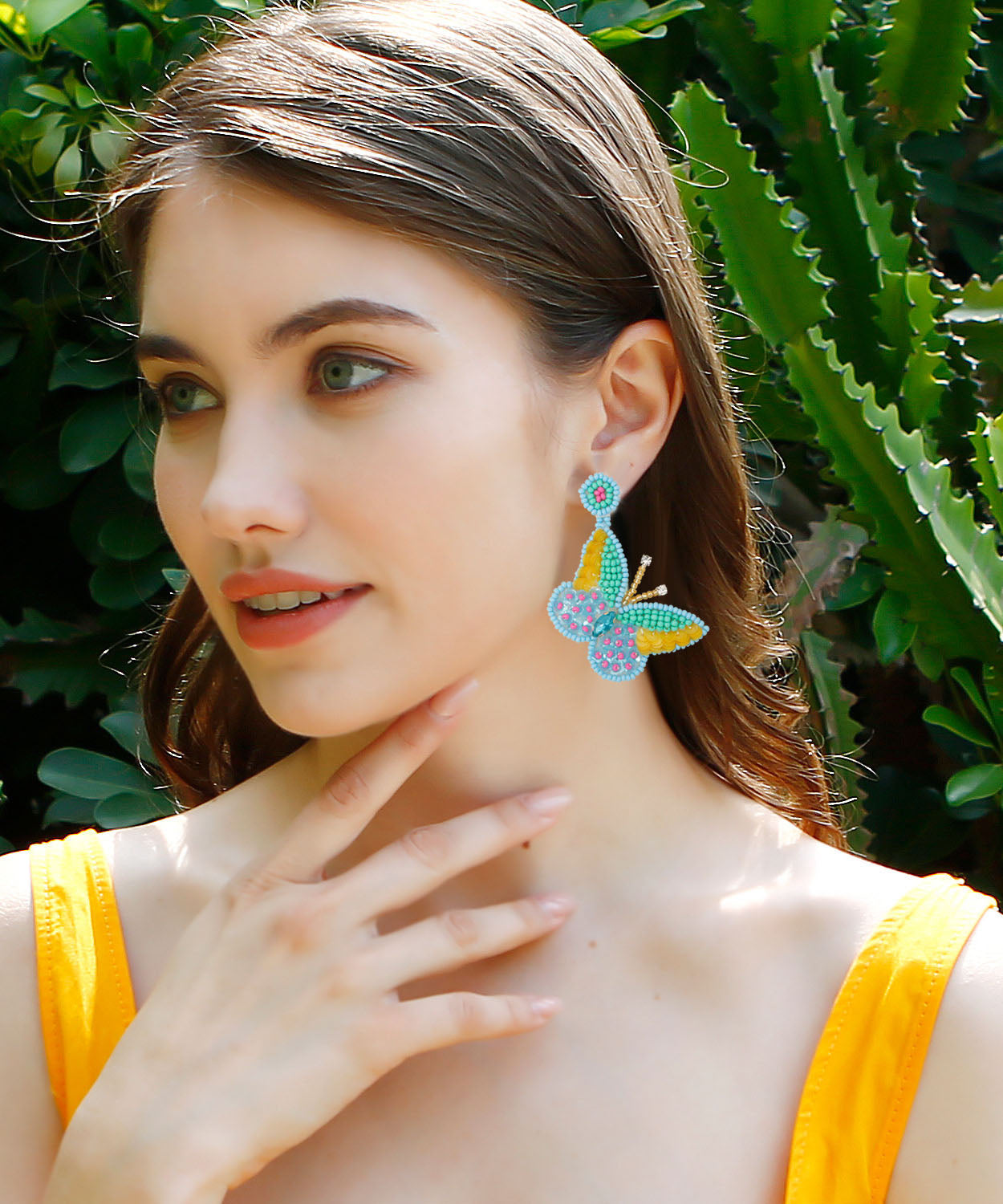 Boutique Ohrringe mit Reisbällchen und Schmetterlingen aus Strickstoff, Blau