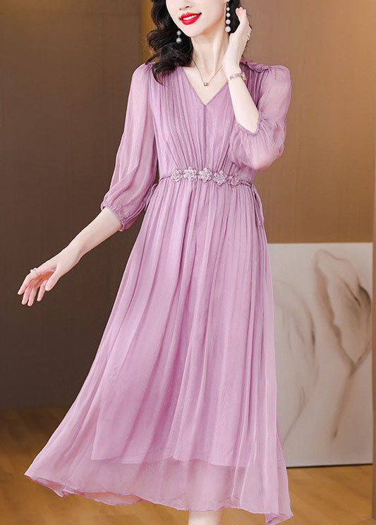 Boutique Blaues Seidenkleid mit V-Ausschnitt und Schnürung, Sommer