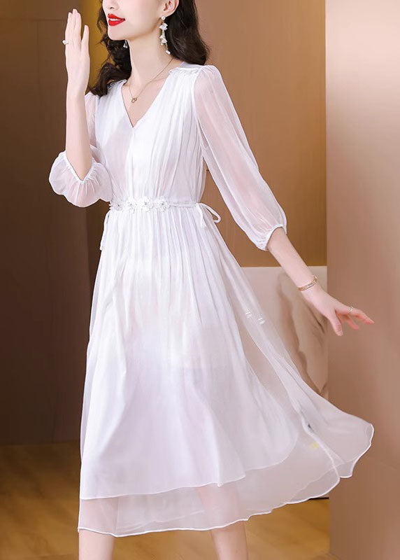 Boutique Blaues Seidenkleid mit V-Ausschnitt und Schnürung, Sommer