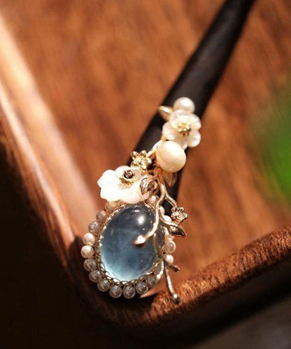 Boutique Blaue Haarnadel aus Holz, Perle, Blumen und Kristall