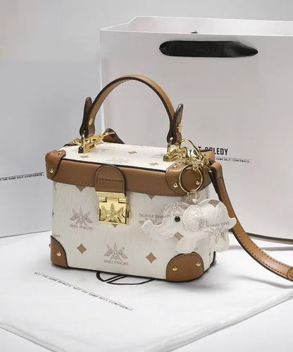 Minibolso Boutique de piel de becerro sólida, duradera, marrón y blanca