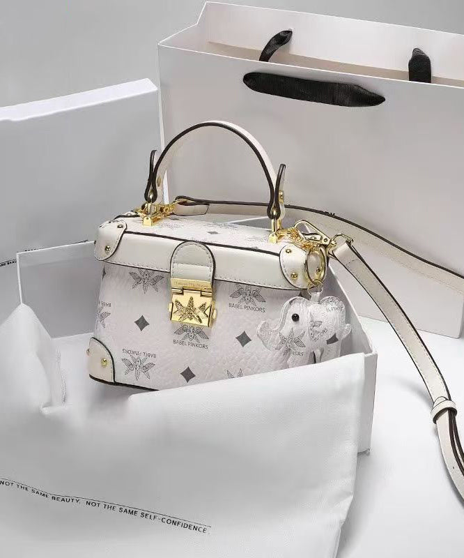 Minibolso Boutique de piel de becerro sólida, duradera, marrón y blanca