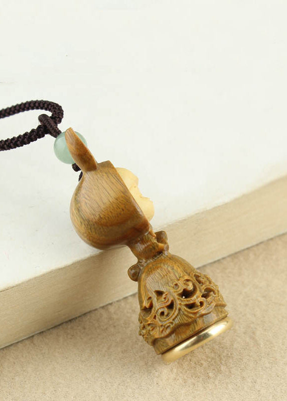 Collar con colgante de conejo y jade ahuecado de Boutique Ginger