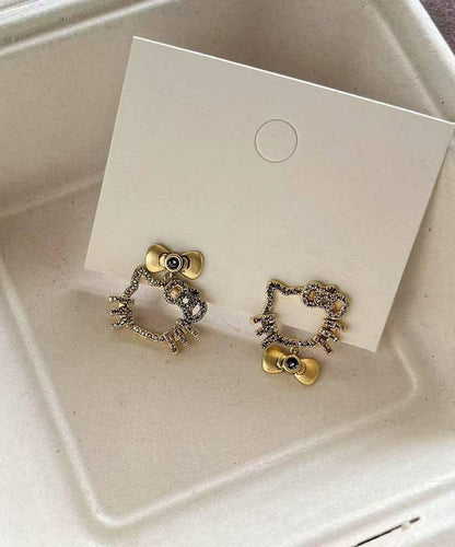 Pendientes boutique con lazo de gatito y circonitas de cobre y oro