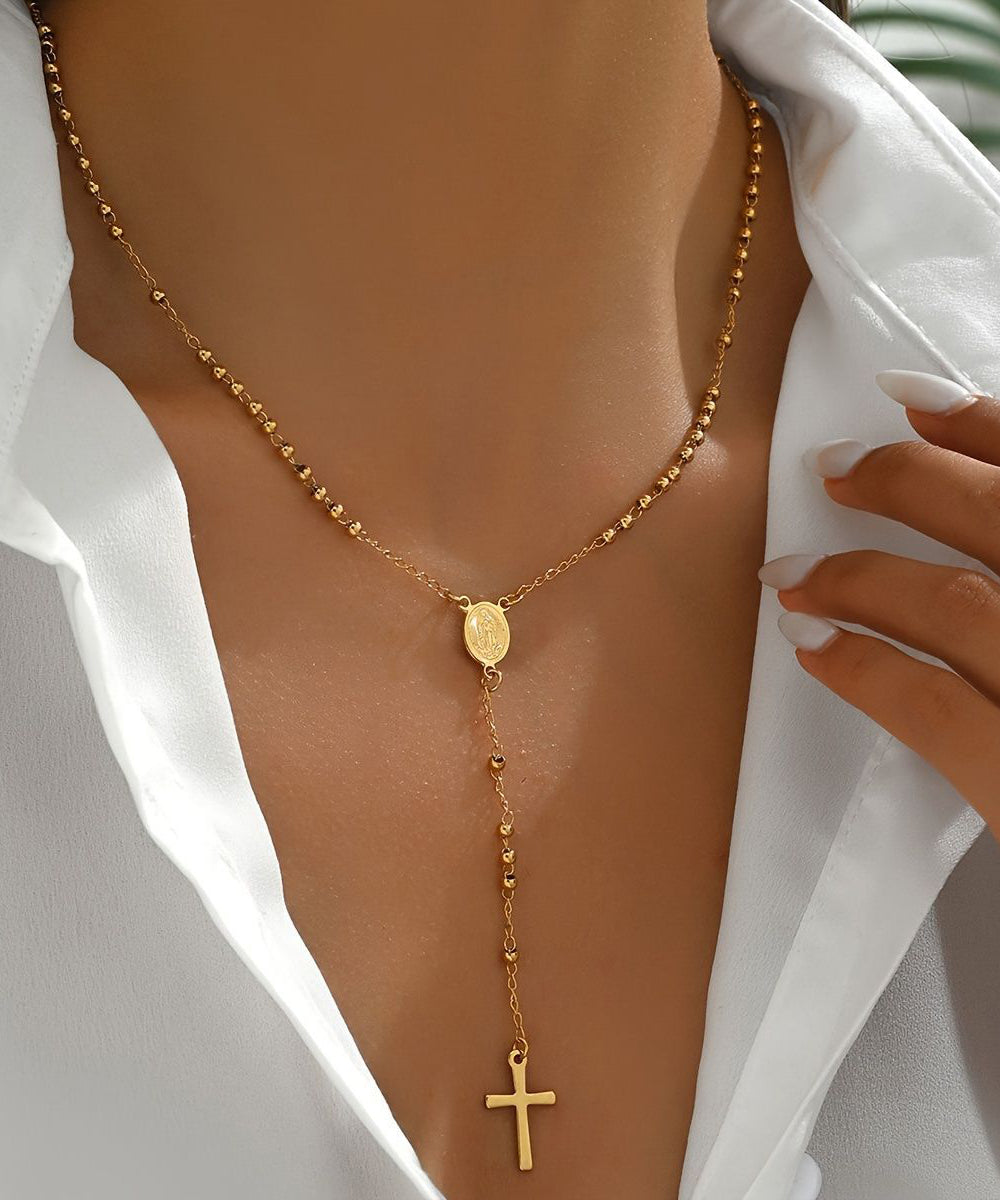 Collar con colgante de cruz de aleación de acero inoxidable y oro boutique