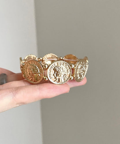 Boutique-Armreif aus Gold, Sterlingsilber, Legierung und Kupfermünze