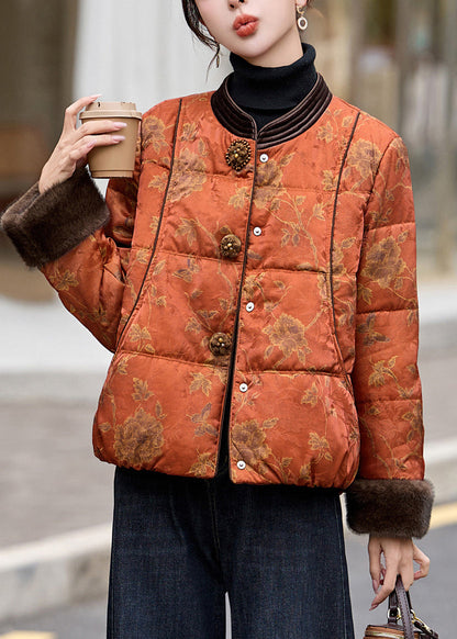 Boutique-Winterjacke aus orangefarbenem Patchwork-Kunstpelz mit feiner Baumwollfüllung und Print aus Kunstfell.