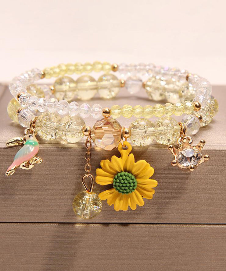 Pulsera boutique con dije de pajarito floral de cristal rosa