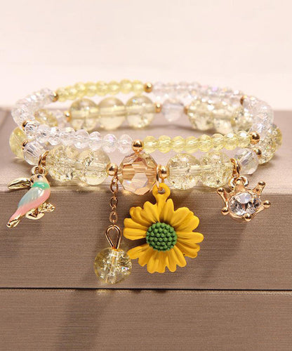 Pulsera boutique con dije de pajarito floral de cristal rosa