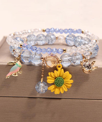 Pulsera boutique con dije de pajarito floral de cristal rosa