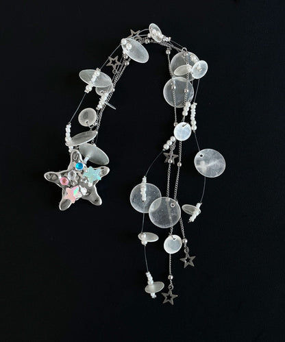 Horquilla con borlas de estrellas y conchas de acrílico de seda boutique