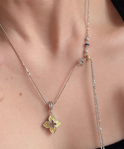 Collar con colgante de borla de trébol de cuatro hojas con circonitas de cobre y seda de boutique