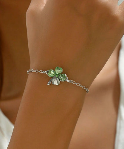 Pulsera de acero inoxidable con dije floral de cristal de seda boutique