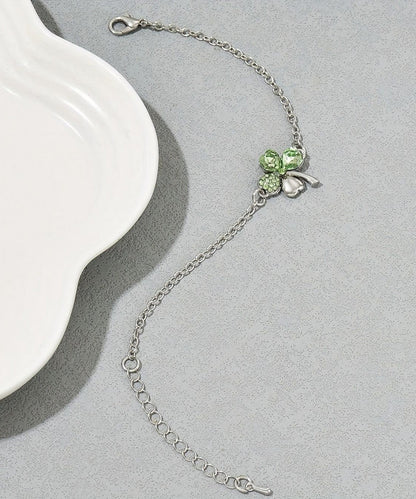 Pulsera de acero inoxidable con dije floral de cristal de seda boutique