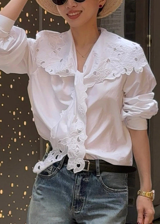 Top de algodón blanco con encaje bordado y huecos de Boutique Primavera