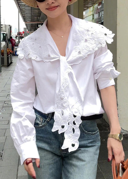 Top de algodón blanco con encaje bordado y huecos de Boutique Primavera