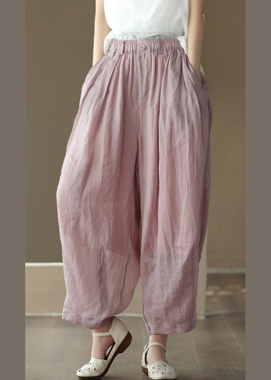 Pantalones cortos de verano de color rosa con cintura elástica, anchos y pierna de ramio liso.