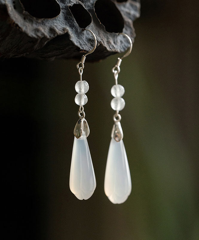 Pendientes colgantes con flor de magnolia y calcedonia rosa en plata de ley