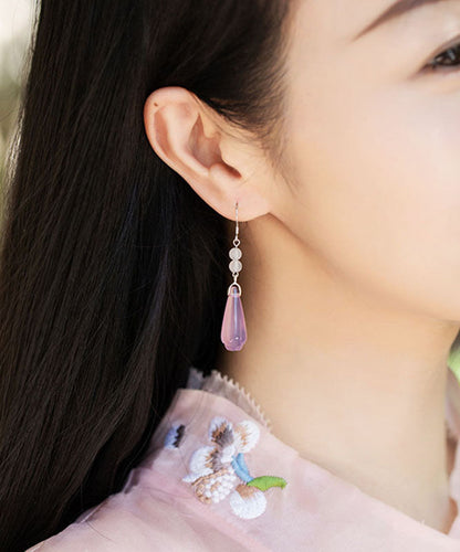 Pendientes colgantes con flor de magnolia y calcedonia rosa en plata de ley
