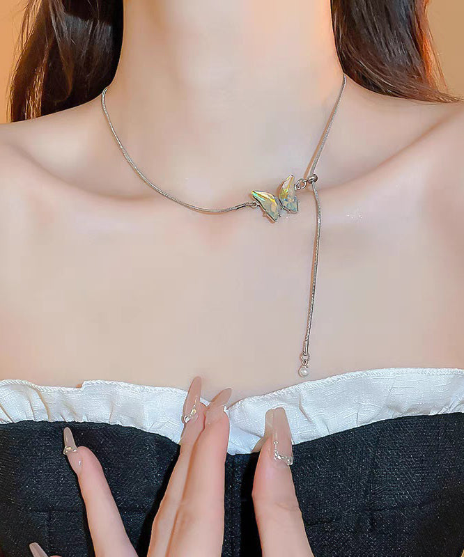 Collar con colgante de mariposa y borla de acero inoxidable de seda