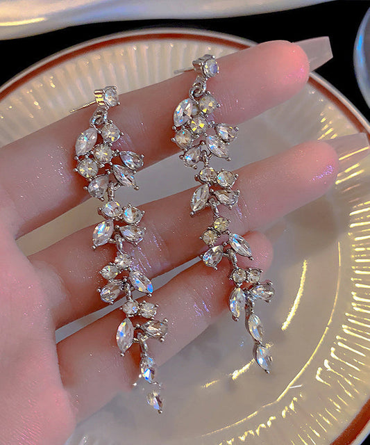 Pendientes de plata de ley con borlas y hojas de circonitas en seda