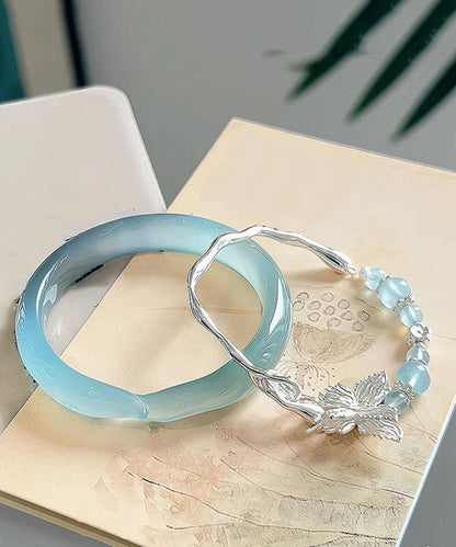 Zweiteiliges Set aus schlichtem Armreif aus Sterlingsilber mit Zirkonia und Jade in Schmetterlingsform