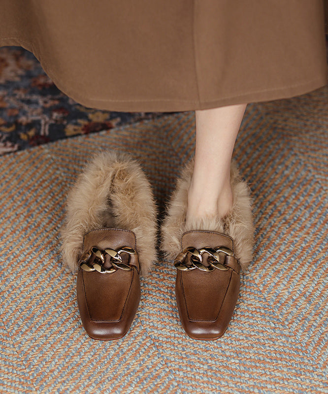 Braune Penny Loafer aus Rindsleder mit elegantem Ziernähten und flauschigem Wollfutter