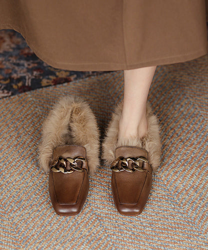 Braune Penny Loafer aus Rindsleder mit elegantem Ziernähten und flauschigem Wollfutter