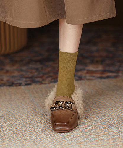 Braune Penny Loafer aus Rindsleder mit elegantem Ziernähten und flauschigem Wollfutter