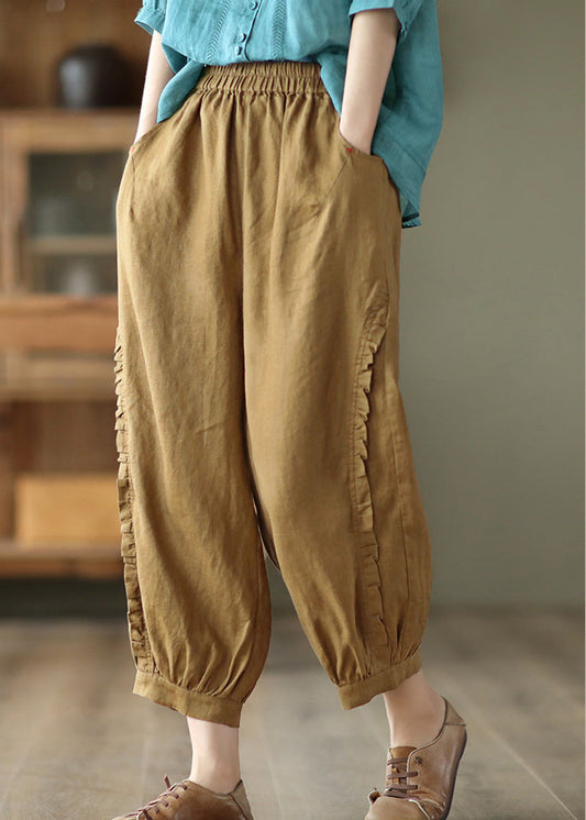 Pantalones cortos marrones con cintura elástica y volantes