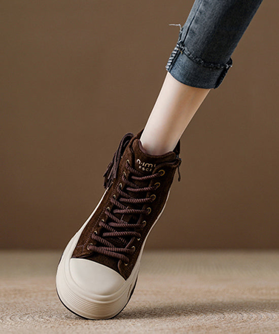 Botas de plataforma con borlas y cordones de ante color camello