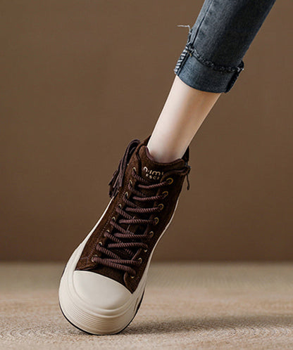 Botas de plataforma con borlas y cordones de ante color camello