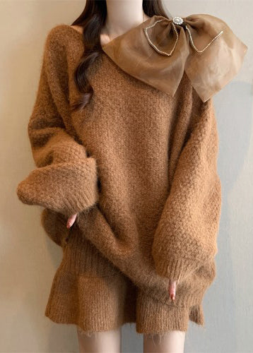 Zweiteiliges Set aus karamellfarbenem Patchwork-Baumwollstrickpullover und -rock mit Laternenärmeln