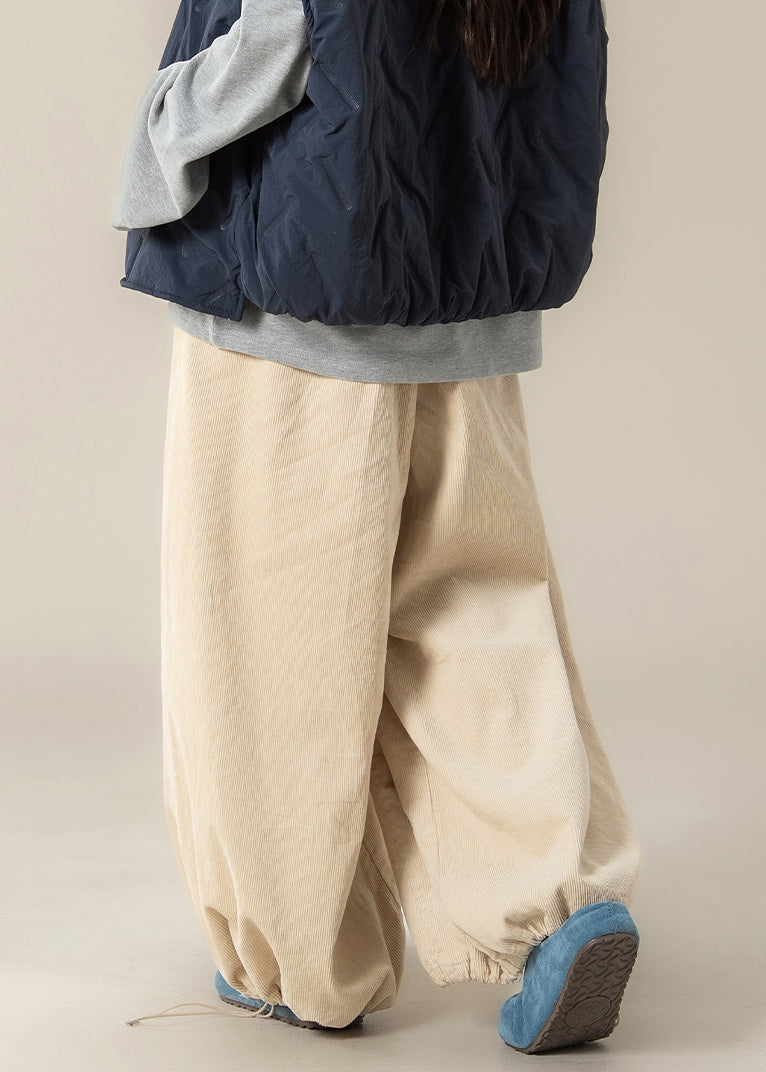 Lässige, aprikosenfarbene Baumwollhose mit hohem Bund und Kordelzug für den Frühling