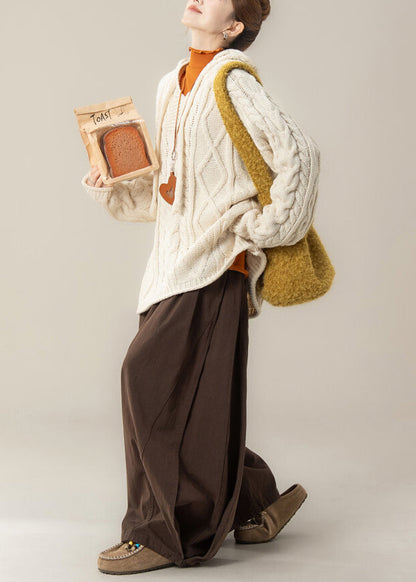 Dreiteiliges Set lässiger beiger Kapuzenstrickpullover für den Frühling