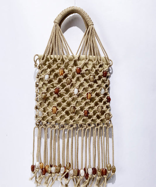 Bolso de mano informal tejido con cuentas y borlas en beige